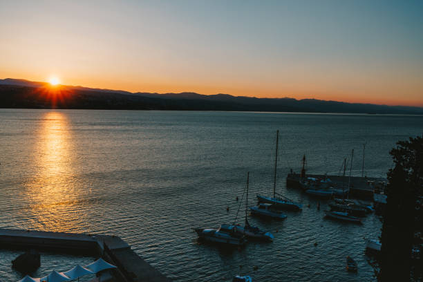 istock Beautiful sunset reflected in water surface, marina in Istrian town 1404635286