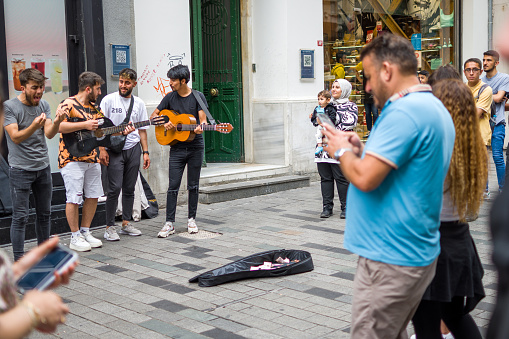 18th June 2019, Dublin, Ireland. Buskers performing on Grafton Street, Dublin City Centre, outside and Irish jewelry shop. .