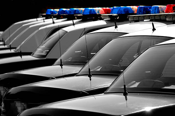 Lisbon, Portugal, November 30, 2025, Multiple amn portuguese national maritime authority vehicles standing in a row on a sunny day