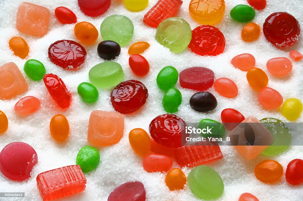 Caramelle e jelly beans - Foto stock royalty-free di Arancione