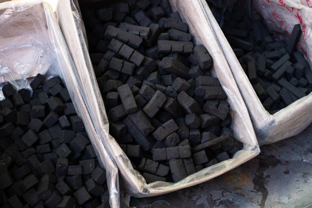 Shisha coal, charcoal pieces for water pipes closeup stock photo