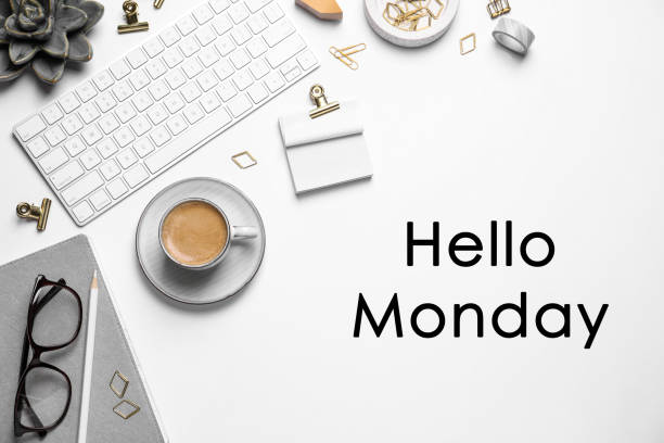 istock Hello Monday, start your week with good mood. Flat lay composition with keyboard and coffee on white background 1404638733