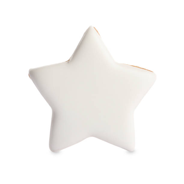 istock Tasty star shaped Christmas cookie isolated on white 1404638810