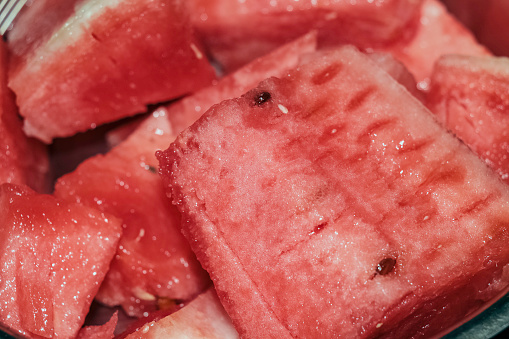 Watermelon slices isolated close up macro