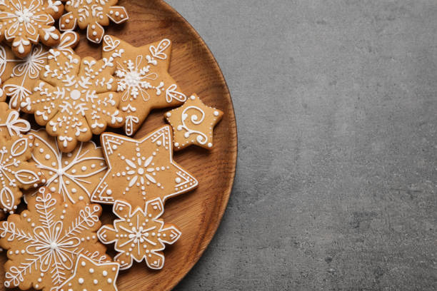 istock Tasty Christmas cookies on grey table, top view. Space for text 1404640220