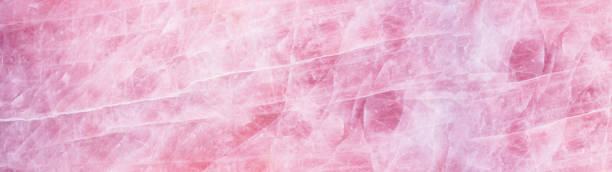 istock Pink rose quartz texture background banner panorama 1404640354