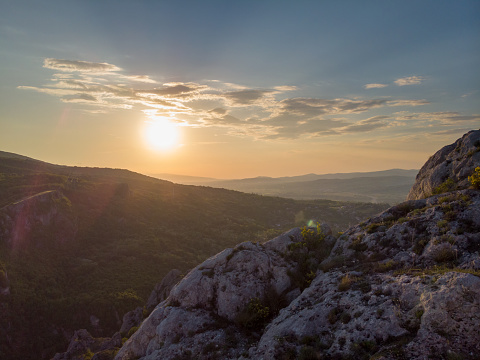 Sunset over the mountain tops and hills. Taken with drone.