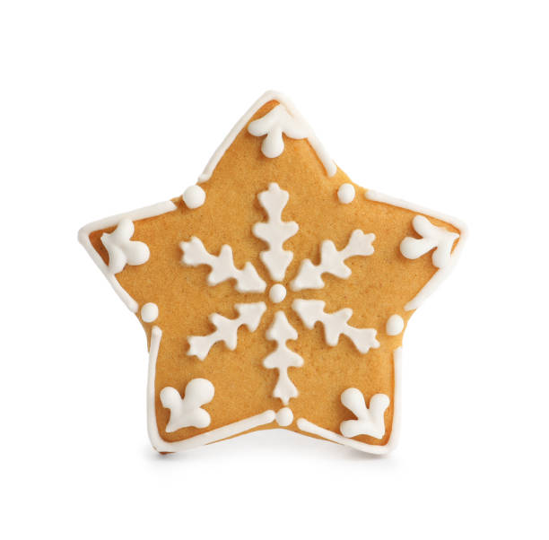 istock Tasty star shaped Christmas cookie isolated on white 1404641225