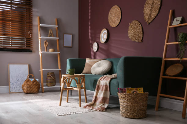 istock Comfortable wooden stool near sofa in living room 1404642152