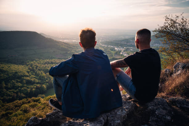 istock Good Friends Together Enjoying the Sunset View 1404642249