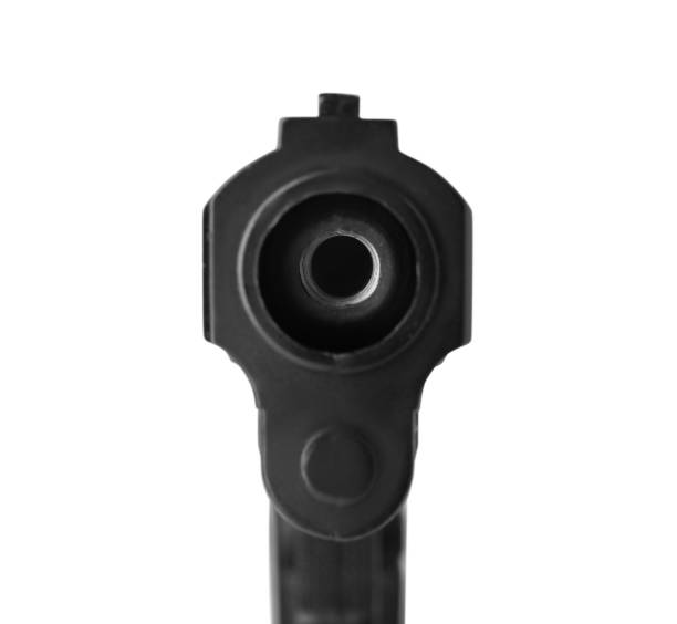 istock Black gun isolated on white. Modern weapon 1404642862