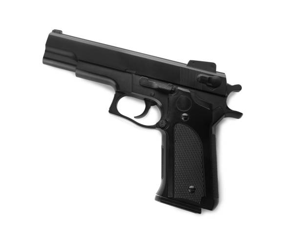istock Black gun isolated on white. Modern weapon 1404642863