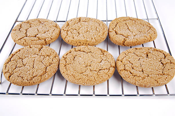 Six molasses cookies cooling  stock photo