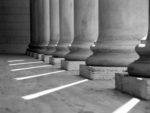 Architectural column detail from old government building in downtown Bucharest, Romania