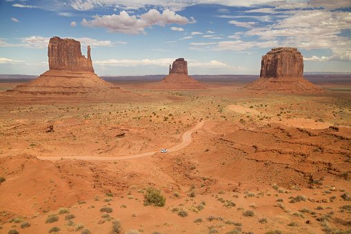 The Mittens and Merrick Butte from Lookout Point in Monument Valley, Arizona, United States.
