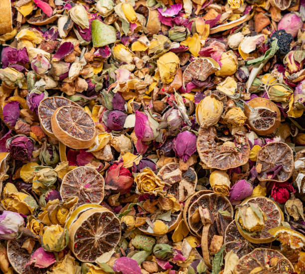 istock mix of dry citrus and multicolored roses close up texture 1404644833