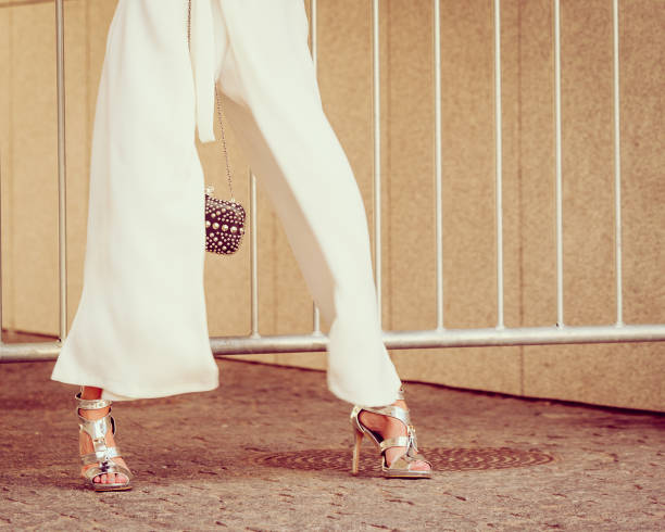 istock Silver high heels, purse and culottes 1404648453