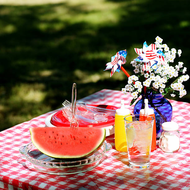 istock Watermelon and water next to condiment bottles at a picnic 140464869