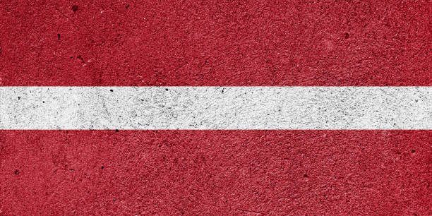 istock National flag of Latvia on a plastered wall 1404649011