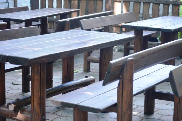istock wooden tables and chairs 1404651669