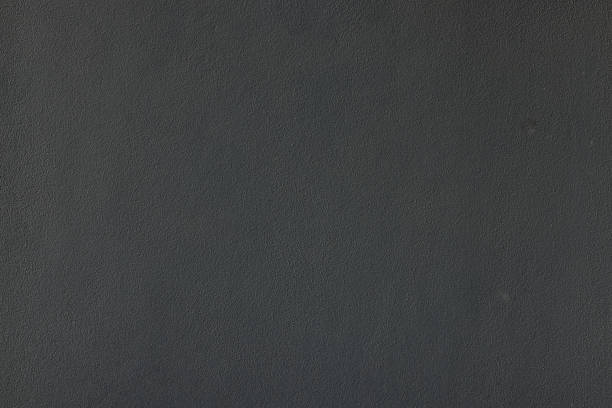 Close-up on a gray concrete wall.