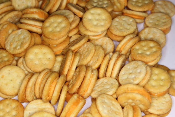 istock Pile of Cheese Snack Crackers Close up 1404652075