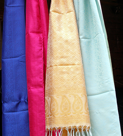 Multi-colored silk scarves on display