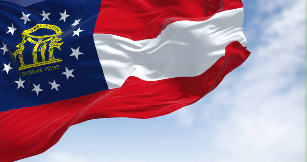 The state flag of Georgia waving in the wind The state flag of Georgia waving in the wind. Georgia is a state in the Southeastern region of the United States. Democracy and independence. georgia flag country stock pictures, royalty-free photos & images