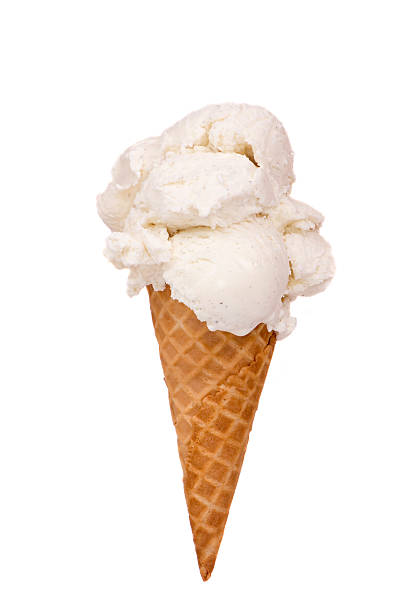Vanilla Ice Cream Cone A very inviting vanilla ice cream cone cone shape stock pictures, royalty-free photos & images