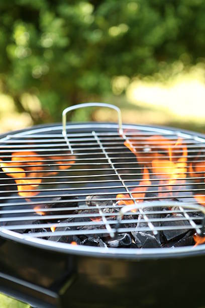 istock Barbecue grill with fire on outdoors 140465878