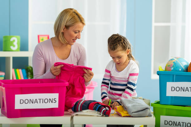 istock Family collecticting donations at home 1404662490