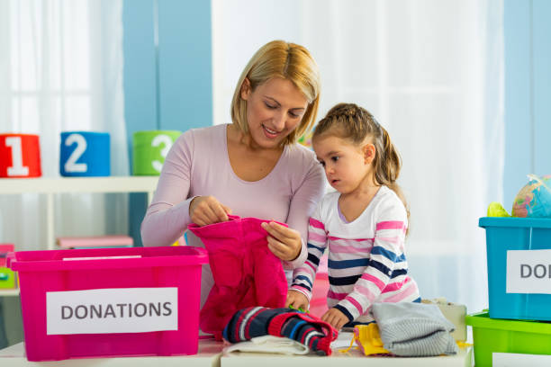 istock Family collecticting donations at home 1404662536