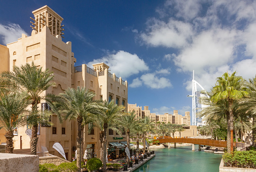 Dubai, UAE - June 23, 2022: Madinat Jumeirah and Burj Al Arab hotel.