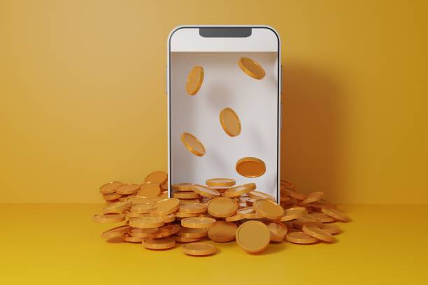 gold-coiuns-on-smartphone-with-yellow-background-digital-wallet-shopping-mobile-app-coins.jpg?s=612x612&w=0&k=20&c=sxngjTsndhjye5f9jYEjIg9eaFam_so3-xy4gcpLGc4=