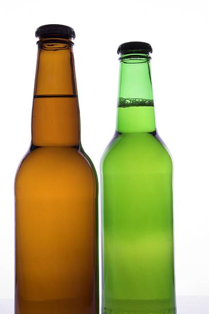 two beer bottles with no labels stock photo