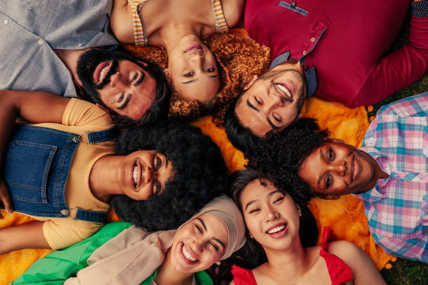 istock Happy friends head circle in park 1404670454