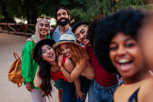 istock Friends on vacation taking selfie 1404670567