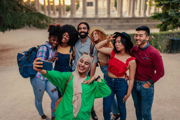 istock Tourists taking selfie in city 1404670577