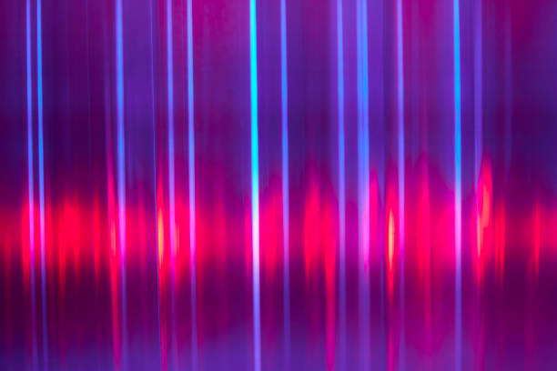 istock Multi exposure of triangular prism glass with red and blue lights abstract background 1404671704