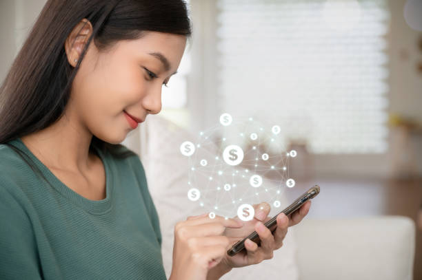 istock Asian woman hand using mobile smart phone with online transaction application. Concept of financial technology - fintech 1404671791