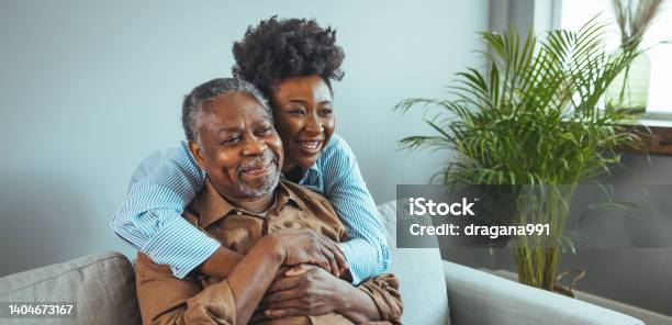Adult Daughter Visits Senior Father In Assisted Living Home Stock Photo - Download Image Now