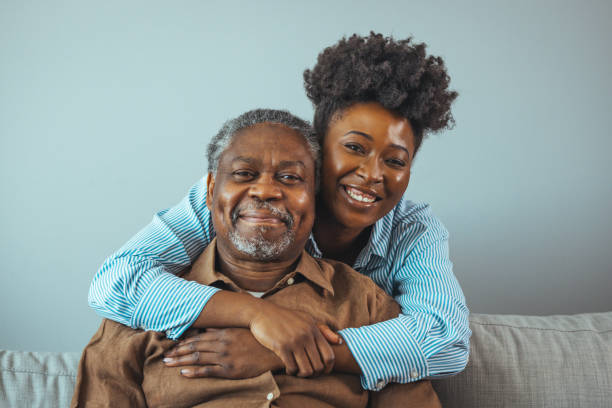 portrait of father and daughter laughing and being happy. - senior adult with daughter father imagens e fotografias de stock