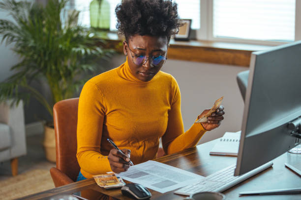 istock Single young african housewife with many debts feeling stressed 1404673526