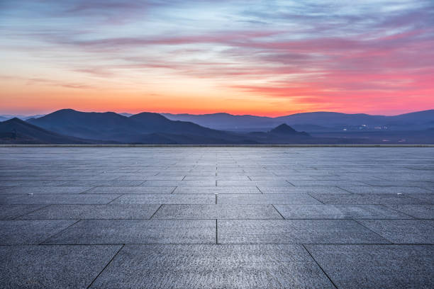 istock Empty floor and mountain landscape at sunrise 1404673872