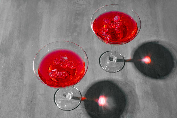 istock Cold pink cocktail on concrete background close up 1404675304
