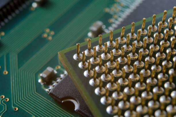 istock microprocessor on the background of the microcircuit of the motherboard. 1404676593