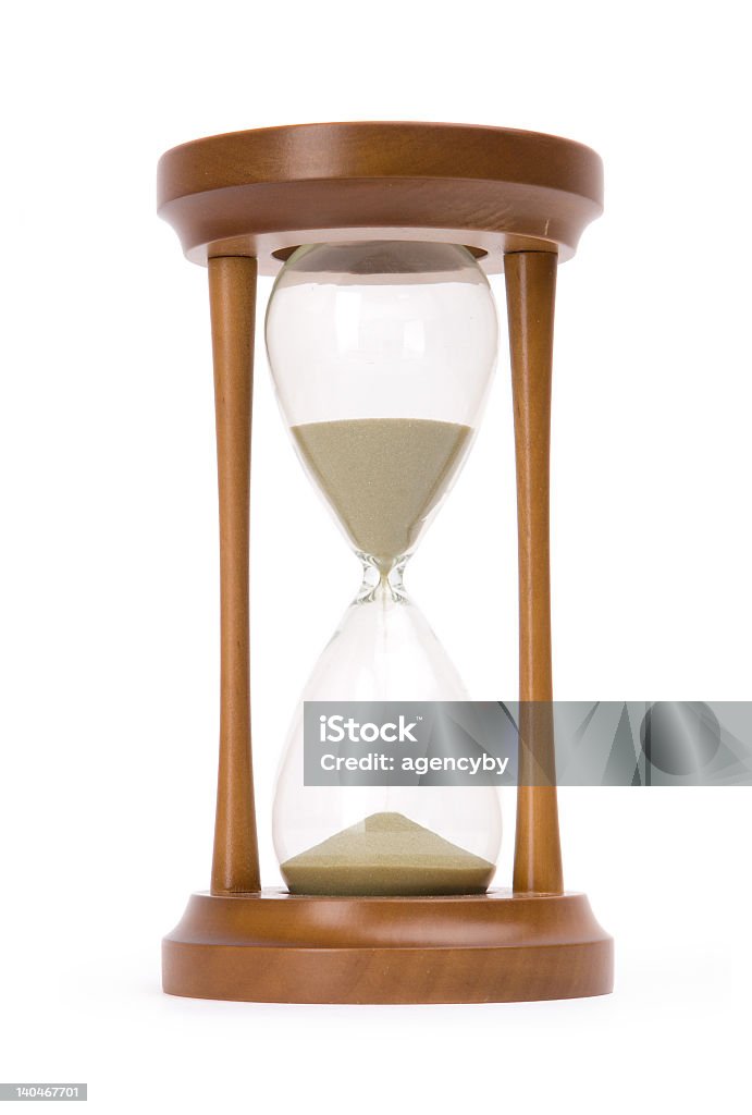 Old fashioned wood and glass sand timer Beautiful old-fashioned sand-glasses isolated on white Hourglass Stock Photo