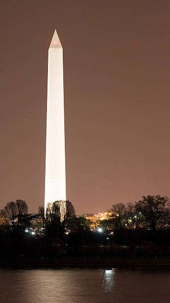 istock Washinton Monument lit by city 140467884