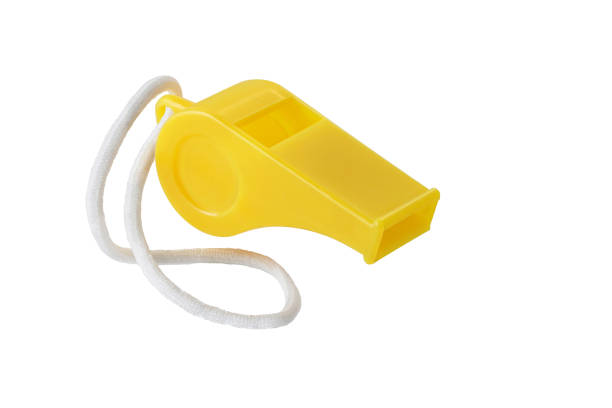 Yellow whistle and white rope Isolated on White Background. With clipping path.