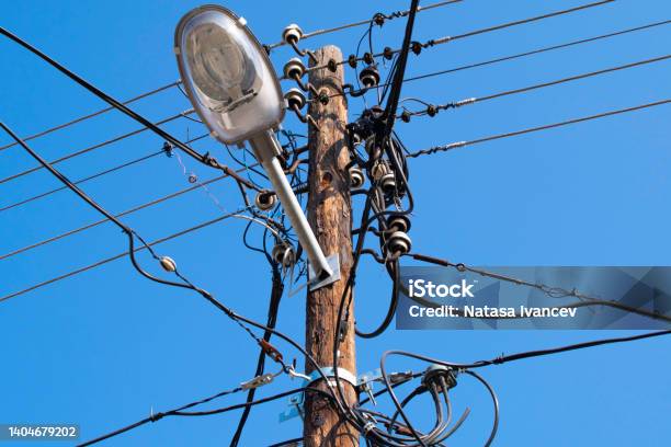 Electricity Power Wire And Street Lamp Stock Photo - Download Image Now - Architectural Column, Blue, Cable